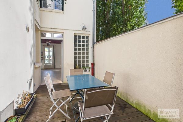 Coeur de Bécon. Charmante maison ancienne rénovée avec terrasse.