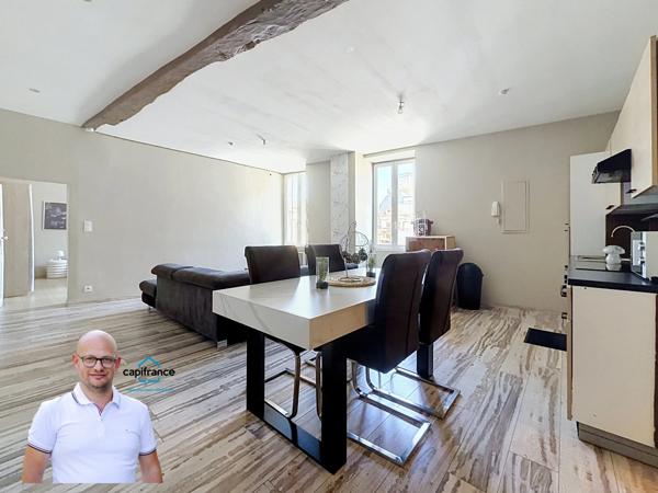 Immeuble de rapport en hyper-centre d'Aoste (38490) – Local commercial loué + T3 libre + Combles aménageables