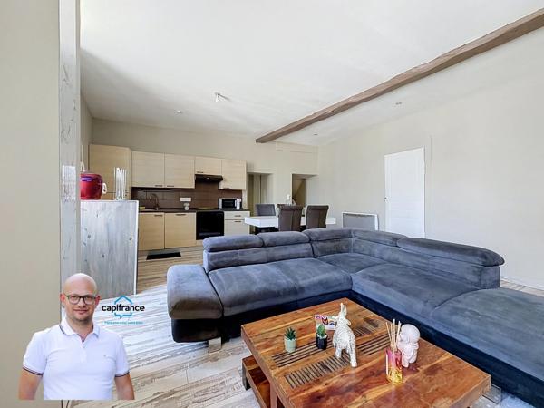 Immeuble de rapport en hyper-centre d'Aoste (38490) – Local commercial loué + T3 libre + Combles aménageables