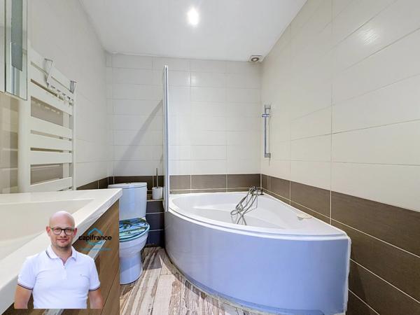 Immeuble de rapport en hyper-centre d'Aoste (38490) – Local commercial loué + T3 libre + Combles aménageables