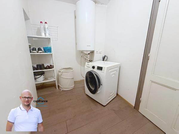 Immeuble de rapport en hyper-centre d'Aoste (38490) – Local commercial loué + T3 libre + Combles aménageables