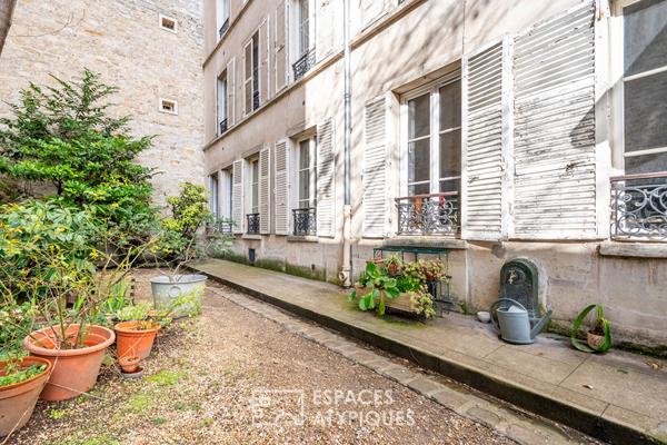 Rez-de-chaussée à réinventer sur jardin au calme d’une impasse