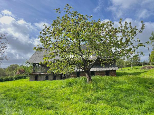 Beaumont-en -Auge- A vendre  grange à rénover avec terrain