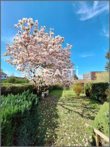 Maison de semi plain pied 3 chambres, grand jardin garage et stationnement privatif