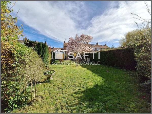 Maison de semi plain pied 3 chambres, grand jardin garage et stationnement privatif