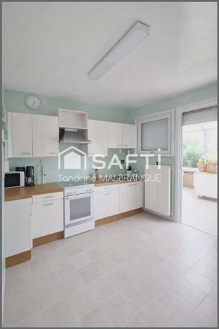 Maison de semi plain pied 3 chambres, grand jardin garage et stationnement privatif