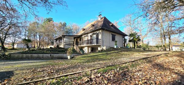 Maison avec sous sol parcelle boise et constructible