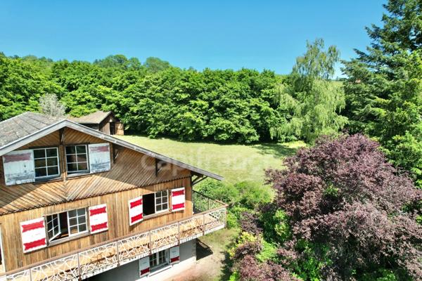 CHALET DE 220 M2, TERRAIN DE 2 668 M2, 4 CHAMBRES, COMBLES AMÉNAGEABLES DE 96 M2, VÉRANDA, VUE PANORAMIQUE, 125 M2 DE SOUS-SOL, GARAGE INDÉPENDANT DE 40 M2, TRAVAUX À PRÉVOIR