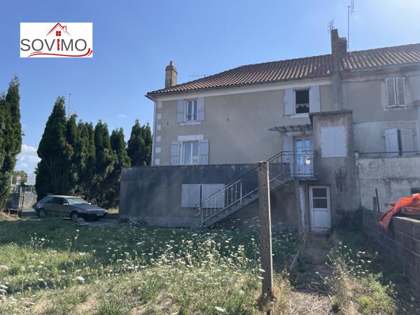 MAISON DE VILLE À RÉNOVER : JARDIN, GARAGE ET BEAU POTENTIEL