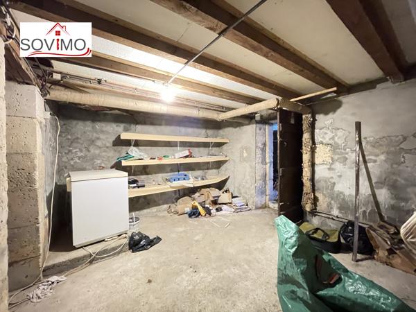 MAISON DE VILLE À RÉNOVER : JARDIN, GARAGE ET BEAU POTENTIEL