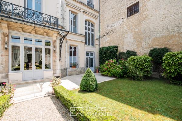 Appartement dans un hôtel particulier du 19ème avec son jardin privatif et son orangerie