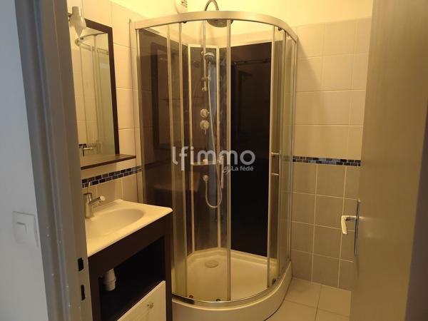 Appartement 3 pièces de 68 m² avec parking privé et cave