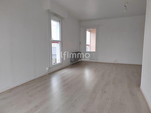 Appartement 3 pièces de 68 m² avec parking privé et cave
