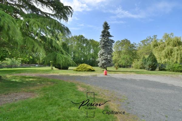 Charmante maison, environnement verdoyant avec 5925 m² de terrain arboré