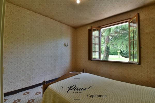Charmante maison, environnement verdoyant avec 5925 m² de terrain arboré