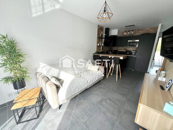 Maison mitoyenne avec terrasse et jardin, calme absolu, stationnement