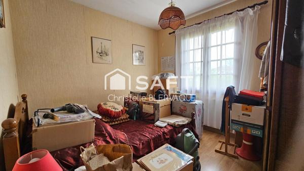 Maison économe en énergie au cœur d’un cadre verdoyant