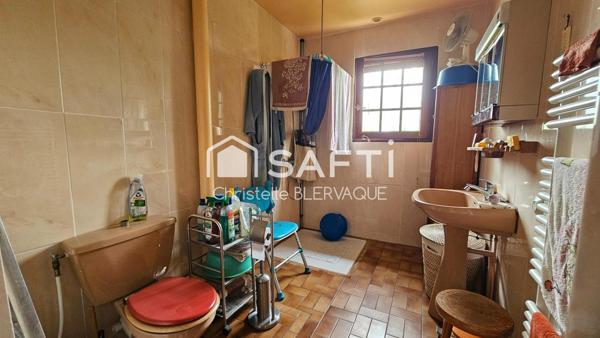 Maison économe en énergie au cœur d’un cadre verdoyant