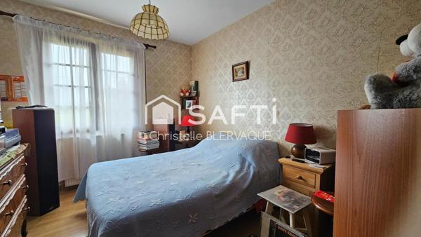 Maison économe en énergie au cœur d’un cadre verdoyant