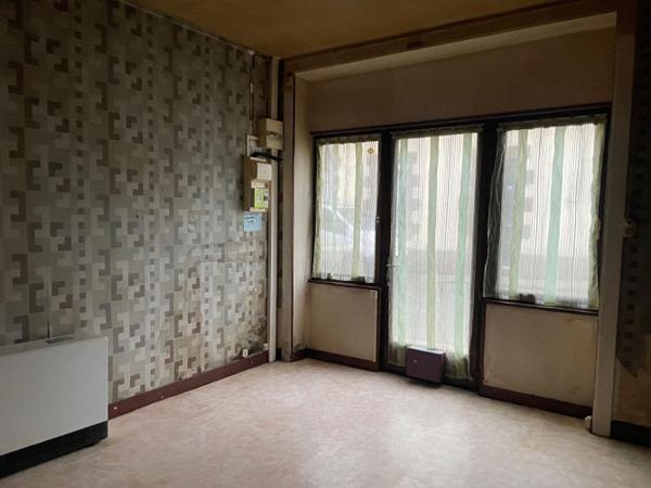 Immeuble à Saint Denis de Gastines