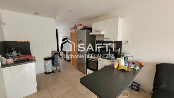 Immeuble 2 maisons 3 chambres chacunes, jardin, stationnement