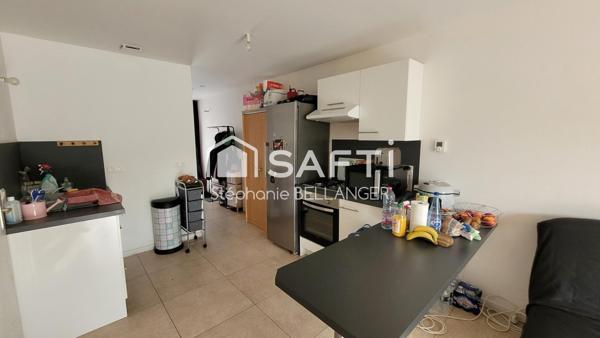 Immeuble 2 maisons 3 chambres chacunes, jardin, stationnement