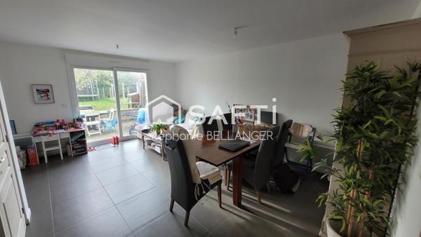 Immeuble 2 maisons 3 chambres chacunes, jardin, stationnement