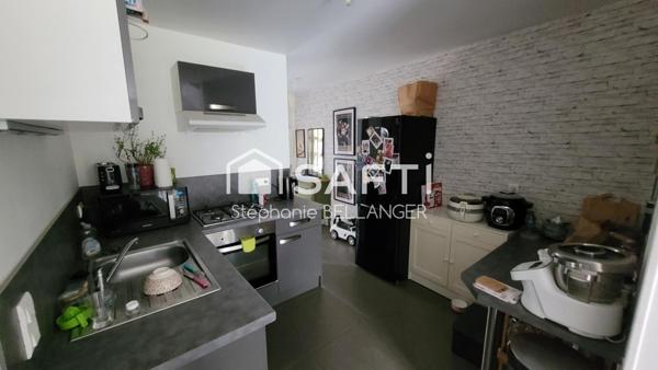 Immeuble 2 maisons 3 chambres chacunes, jardin, stationnement