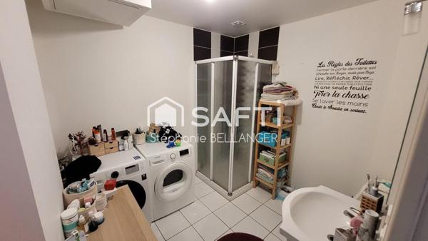 Immeuble 2 maisons 3 chambres chacunes, jardin, stationnement