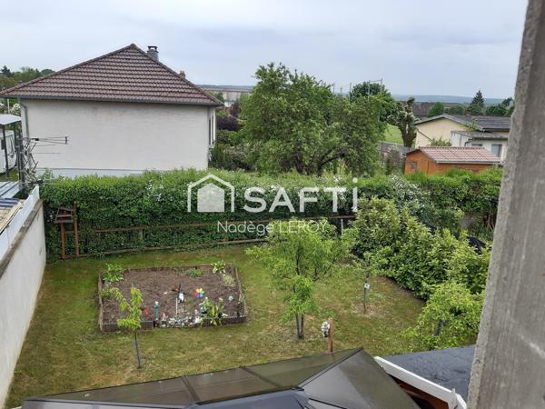 Maison mitoyenne avec jardin