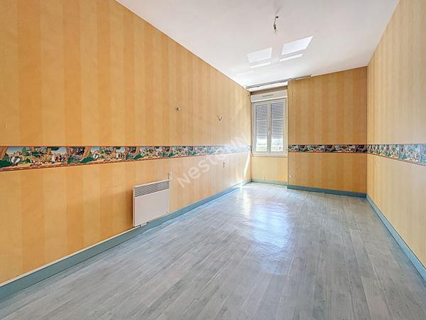 Immeuble de rapport de 135 m² à Champtocé sur Loire comprenant un local commercial et un appartement