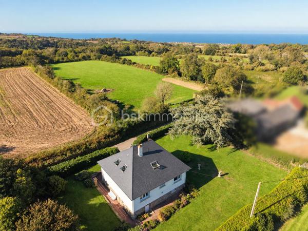 GRANDE PARCELLE DE 1700M² / SOUS-SOL DE 92M² / 4 CHAMBRES / DIAGNOSTIC D / PORTAIL ET PORTE DE GARAGE MOTORISÉS

Dans un quartier calme et apprécié de QUERQUEVILLE, venez découvrir cette maison sur sous-sol de 1967, édifiée sur une parcelle d'un peu plus de 1700m².

À votre arrivée, la paisibilité du secteur se ressent et la nature y est présente.
Au rez-de-chaussée, un spacieux sous-sol de 92m² s'offre à vous. Celui-ci se décline en un grand garage, suivi d'un atelier et d'une buanderie.
Au 1er étage, un couloir distribue une salle à manger agrémentée d'une cheminée et ouverte sur un séjour, une cuisine aménagée et équipée, 2 chambres, une salle de bains avec baignoire et douche, et un WC indépendant.
Au 2ème étage, un pallier dessert une grande pièce aménagée en chambre (pouvant être un bureau ou un espace de jeux), 2 chambres, une salle d'eau et un WC sanibroyeur indépendant.

L'harmonie de ce bien est assurée par une parcelle entièrement close, un portail et une porte de garage motorisés, un ancien poulailler et une proximité mer idéale pour une balade à pieds ou en vélo.

Ce bien rare à la vente n'attend plus que vous.

Informations pratiques : 

- Chauffage au fioul avec cuve de 1500L (consommation annuel actuel : entre 1280L et 1520L)
- Tout à l'égout
- Doubles vitrages PVC
- VMC simple flux

Travaux récents : 

- Toiture ardoise + velux (2014)
- Porte d'entrée (2015)
- Porte garage (2017)

Travaux à prévoir :

- Électricité