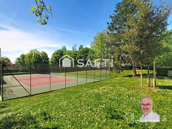 T3 dans un cadre verdoyant et vie pratique à Lyon 8