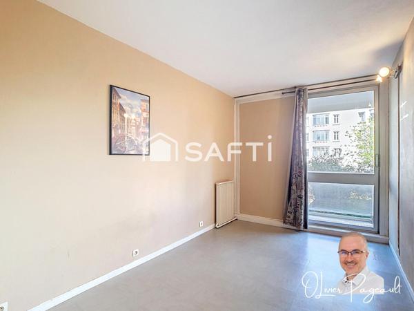 T3 dans un cadre verdoyant et vie pratique à Lyon 8