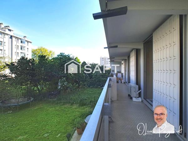 T3 dans un cadre verdoyant et vie pratique à Lyon 8