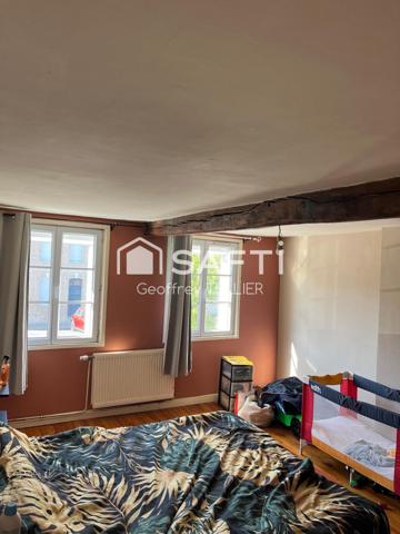 Maison avec terrain en ville