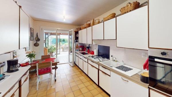 Maison familiale, terrain de 575 m², garage et sous-sol