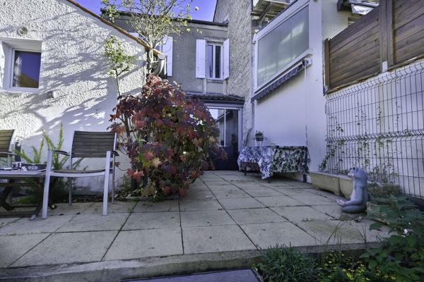 Maison de ville avec Véranda, terrasse, jardin à SAINTES (17)