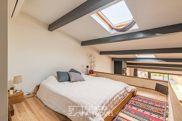 Loft industriel avec grand garage et terrasse plein Ouest