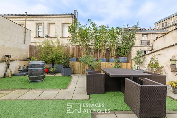 Loft industriel avec grand garage et terrasse plein Ouest