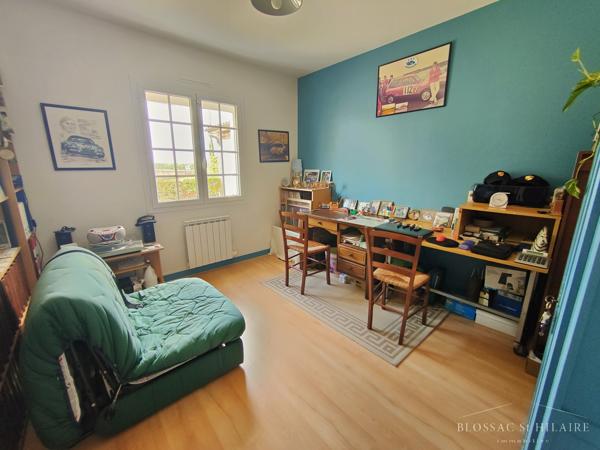Maison 5 pièces de 187m² sur parcelle de 2065m² avec piscine, garages et boulodrome
