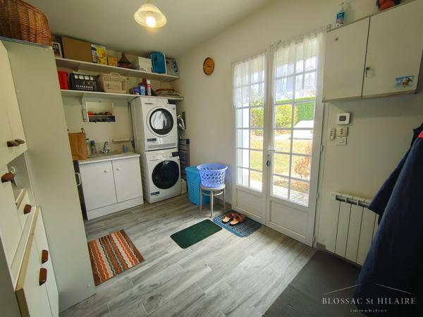 Maison 5 pièces de 187m² sur parcelle de 2065m² avec piscine, garages et boulodrome