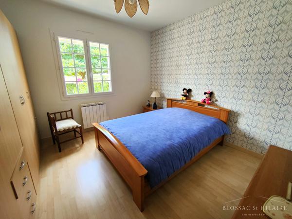 Maison 5 pièces de 187m² sur parcelle de 2065m² avec piscine, garages et boulodrome