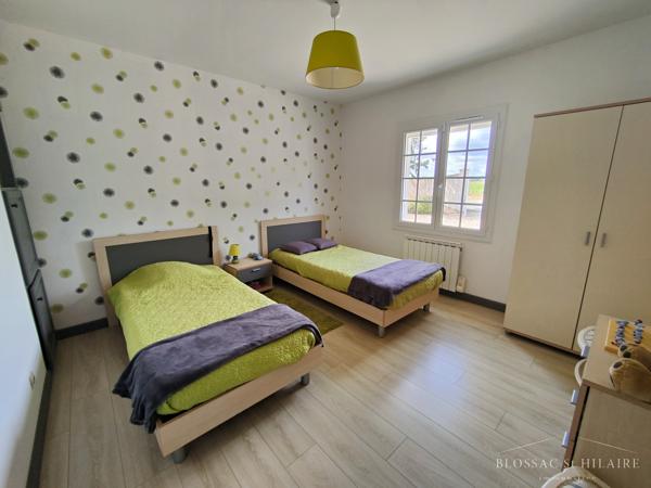 Maison 5 pièces de 187m² sur parcelle de 2065m² avec piscine, garages et boulodrome