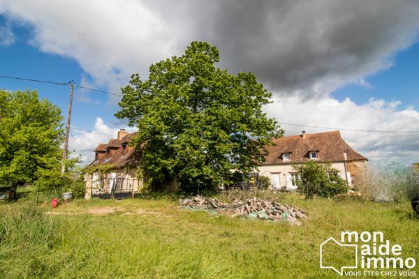 Ensemble de deux maisons sur vaste terrain