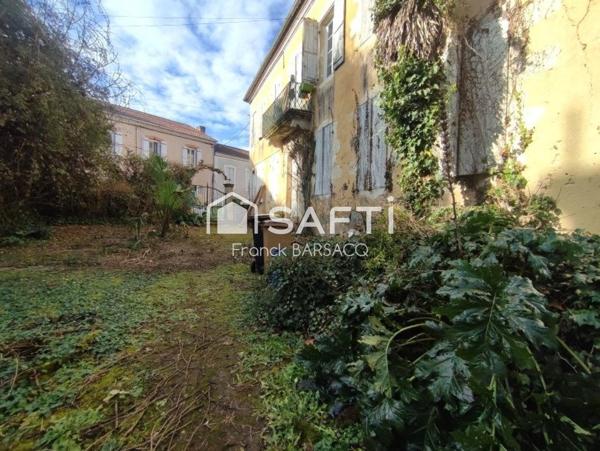 GRAND APPARTEMENT EN REZ DE CHAUSSEE AVEC JARDIN
