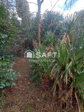 GRAND APPARTEMENT EN REZ DE CHAUSSEE AVEC JARDIN