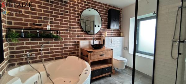 Soucieu-en-Jarrest (69510) Charmante maison en pierre de 120m2 avec jardin et garage. 3 ch