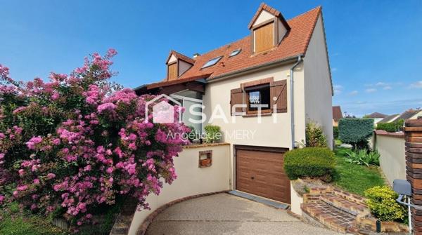 Maison familiale avec jardin arboré, véranda chauffée et chambre de plain-pied