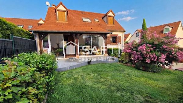 Maison familiale avec jardin arboré, véranda chauffée et chambre de plain-pied
